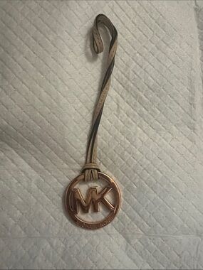 Like New EUC- Michael Kors Rose Gold MK Logo Charm with Tan Strap
